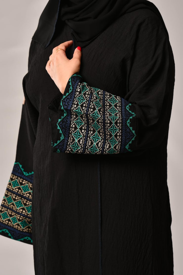 arabic-muslim-woman-stylish-abaya_370405-492 Abaya - Image 1